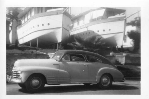 507: Encinitas Boat Houses. 1947 Chevrolet, in front of Twin Boat Houses. Circa 1956
